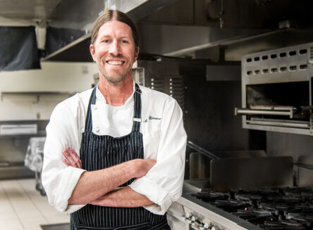 chef andy blanton portrait in an instructional kitchen