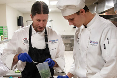 Chef Andy Blanton with culinary student